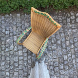 Rattan armchair with armrests