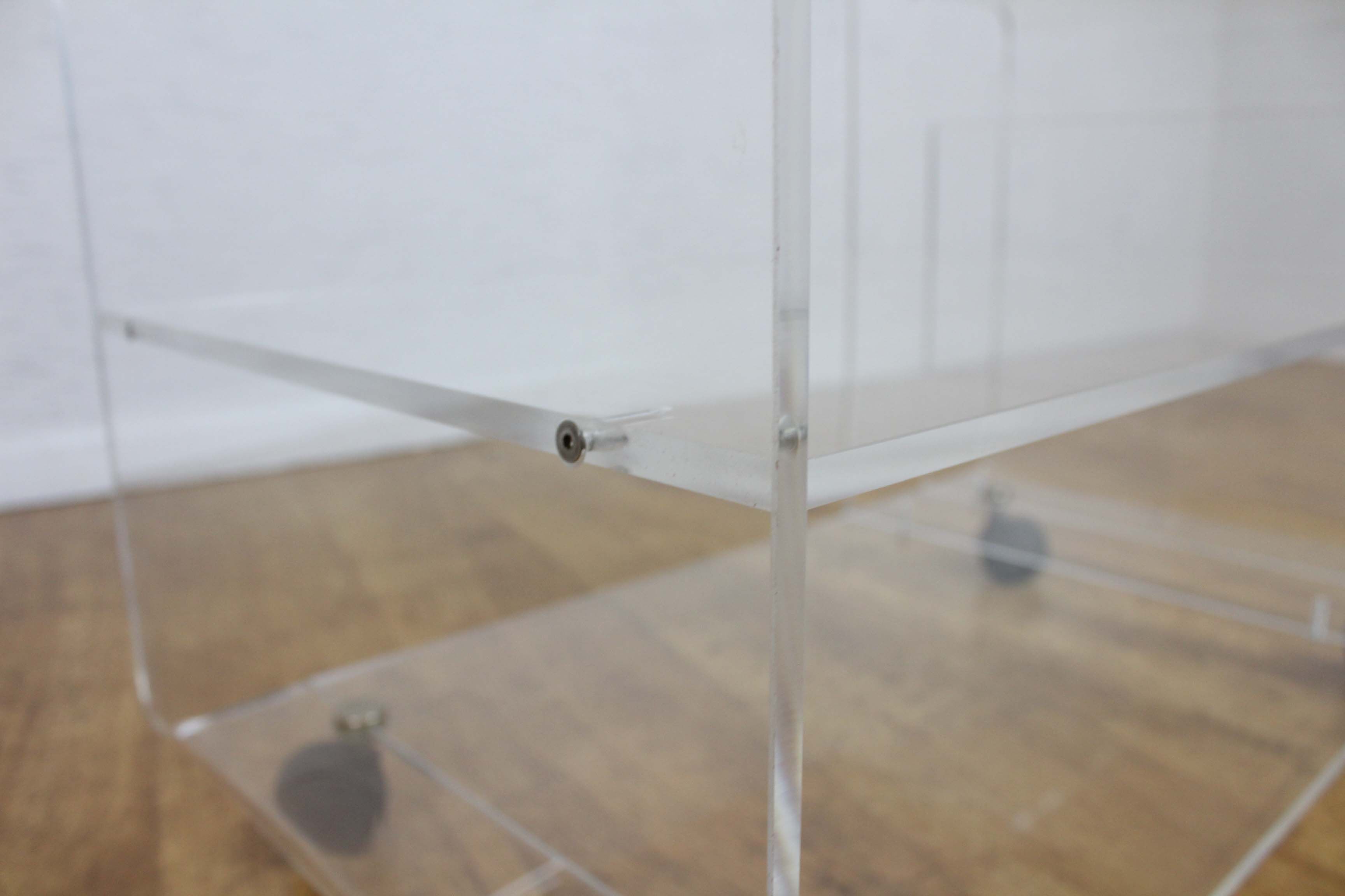 Plexiglas coffee table with vinyl compartment and magazines rack