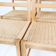 A set of four Kurt Østervig oak dining chairs for K.P. Møbler