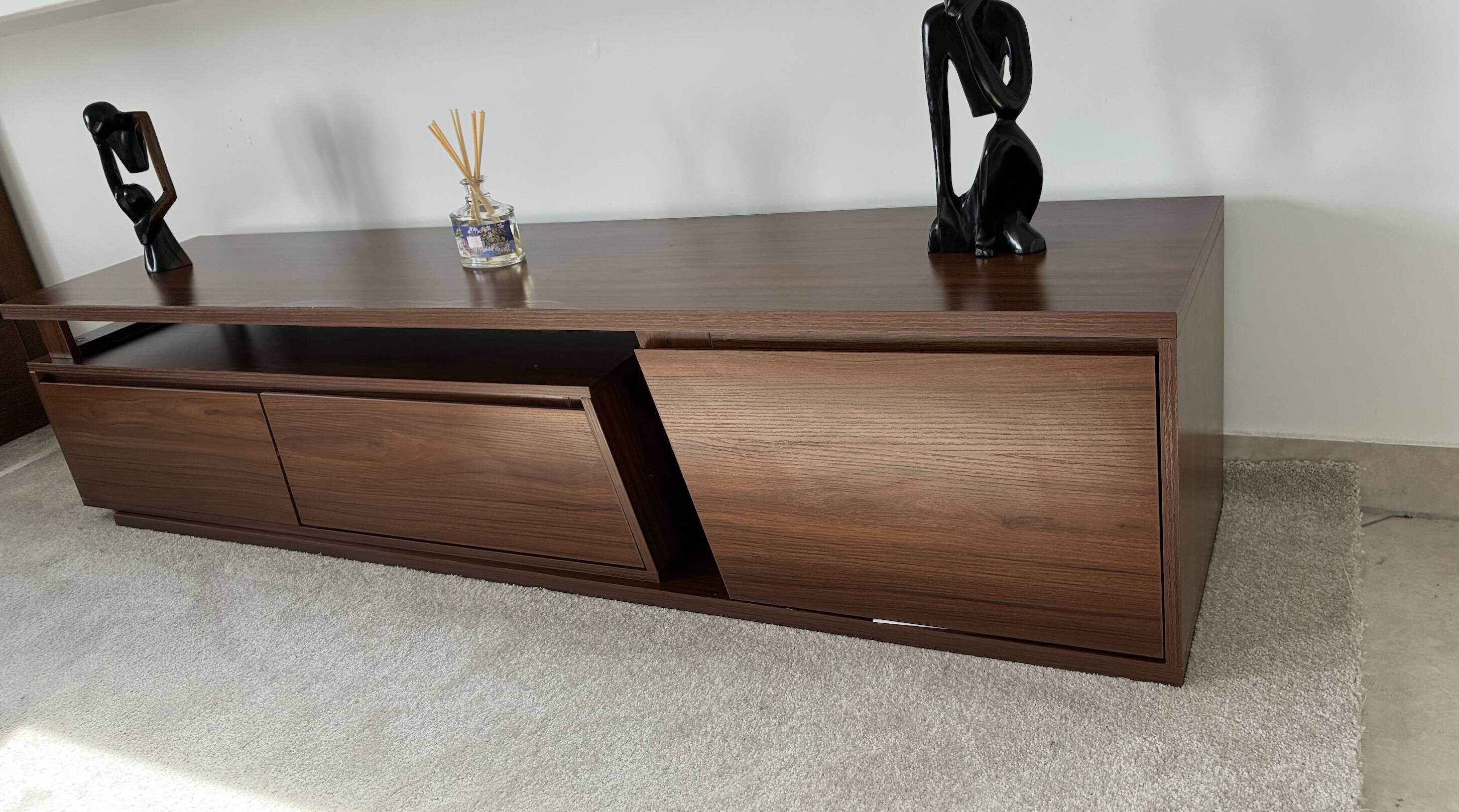 Extendable TV cabinet with walnut finish