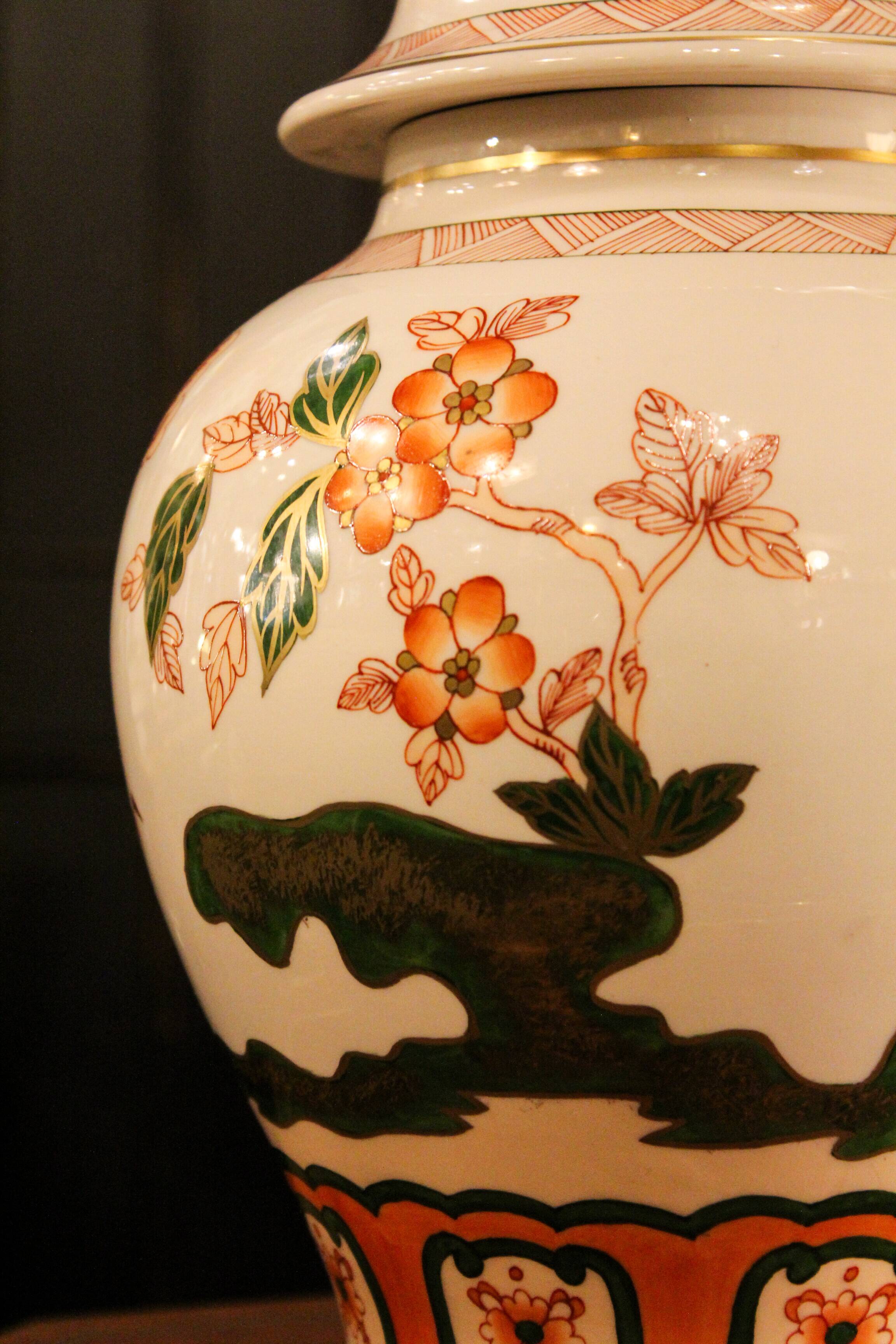 Spanish porcelain lamp hand-painted with floral patterns.
