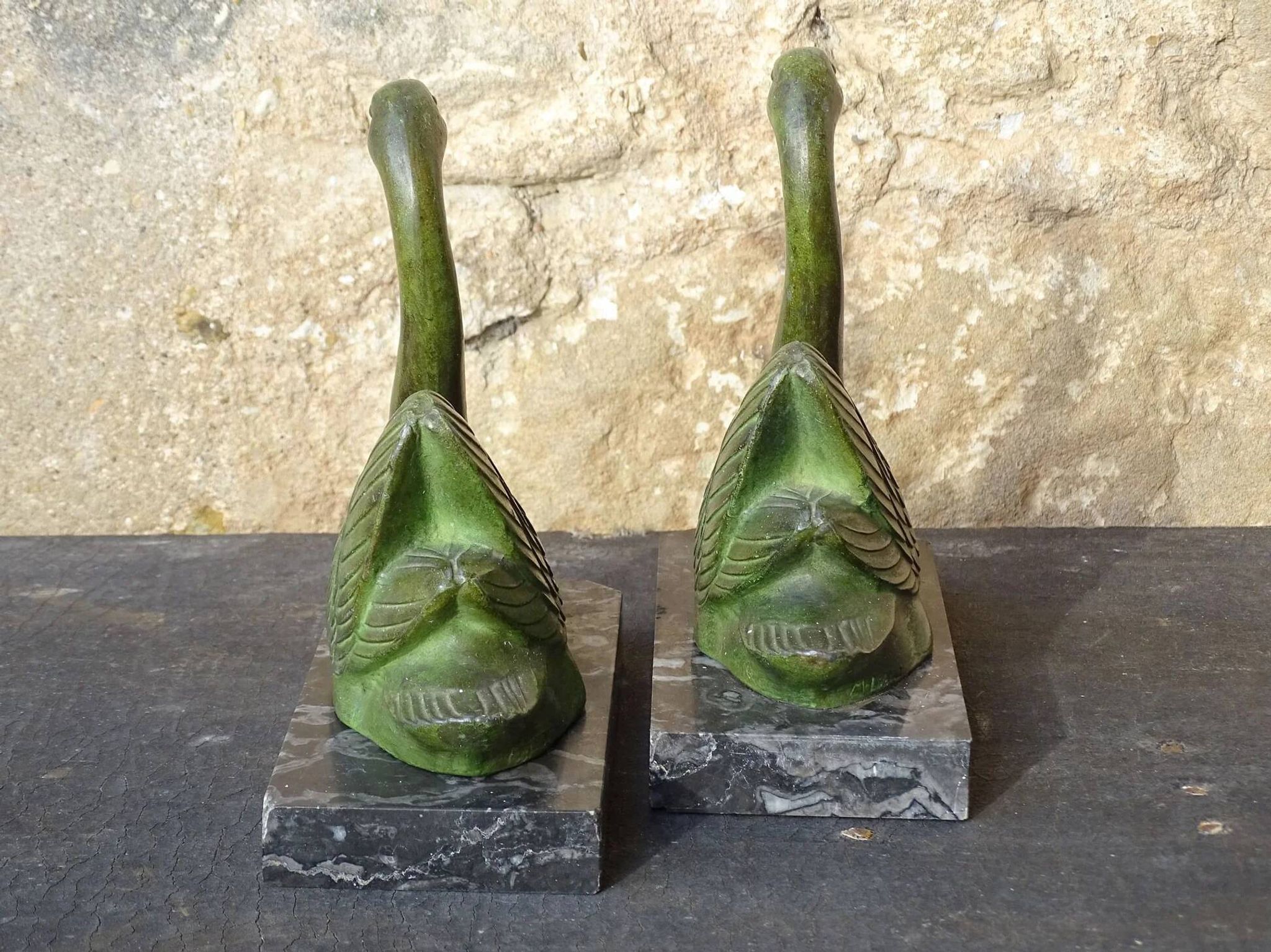 Vintage swan bookends on marble bases