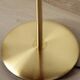 Le Klint 340 floor lamp in brass – design by Philip Bro Ludvigsen