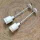 White metal wall sconces