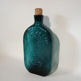 Blue glass bottle bird décor