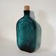 Blue glass bottle bird décor