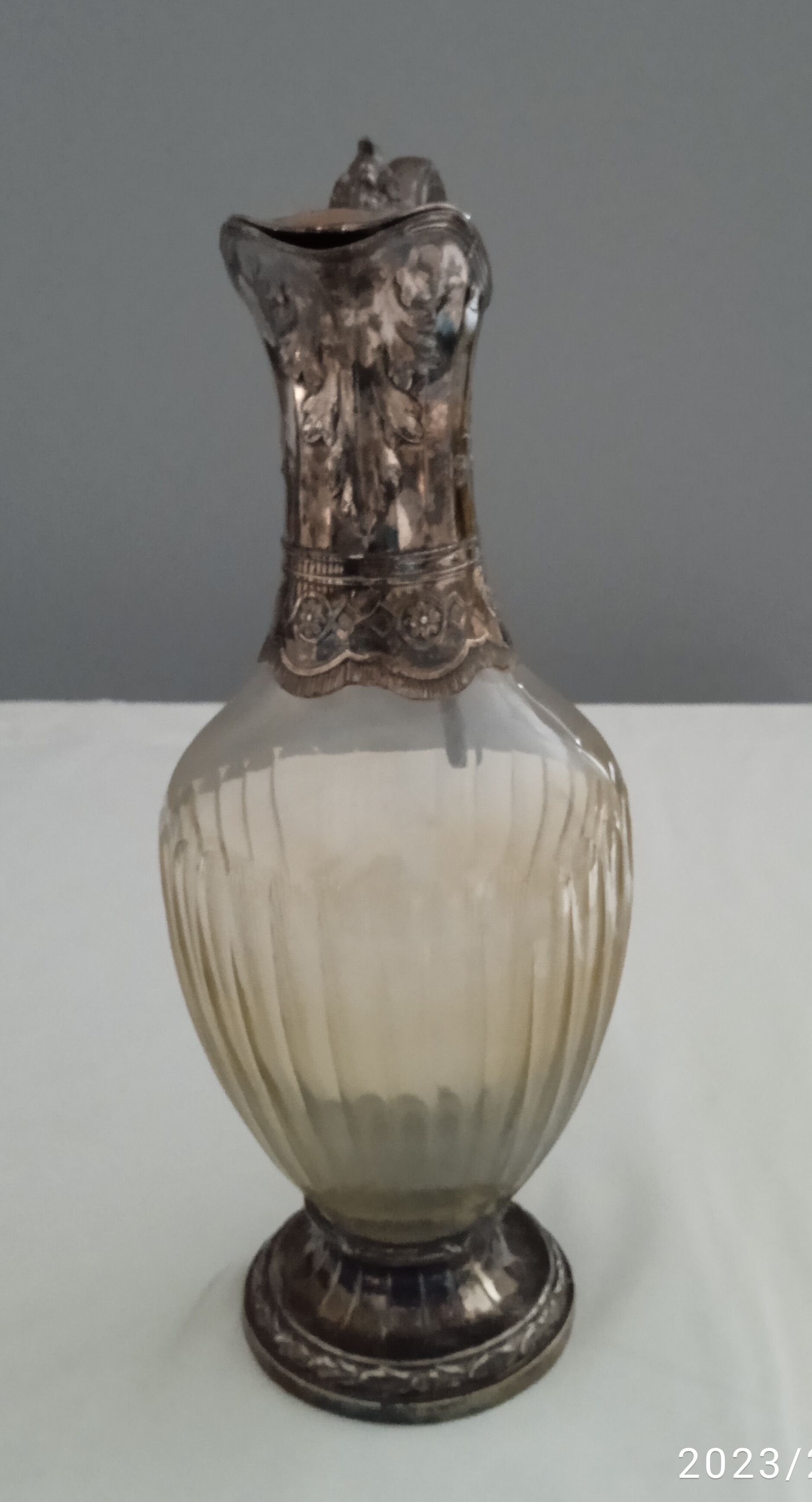 Glass and silver metal ewer