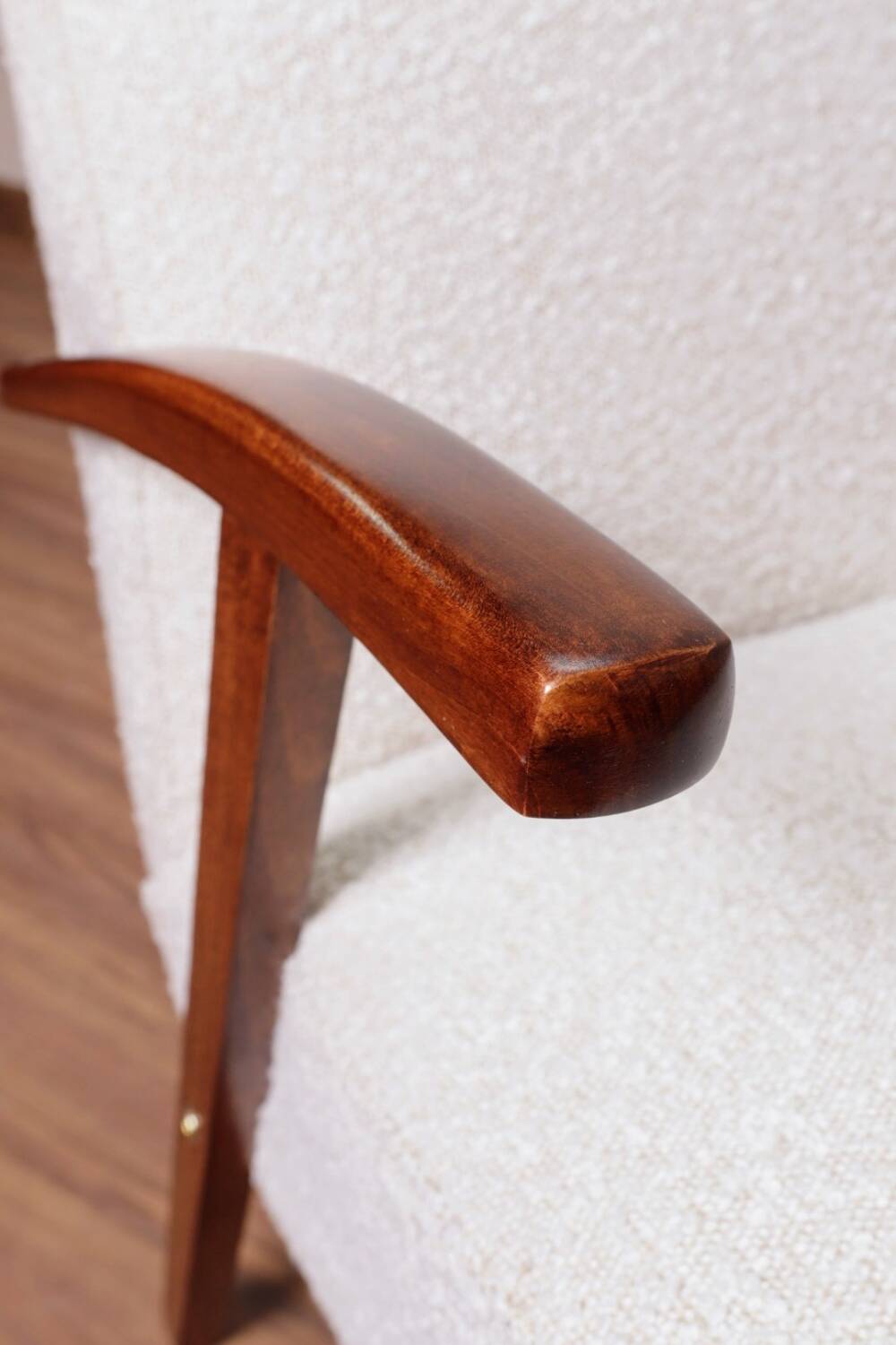 Vintage armchair in pearl white bouclé with walnut wood, 1960.