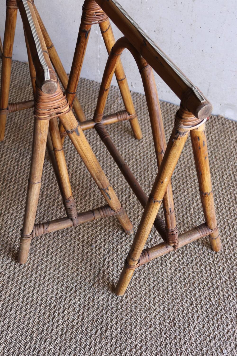 Pair of vintage rattan trestles