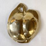 Brass catchall in the shape of an apple.