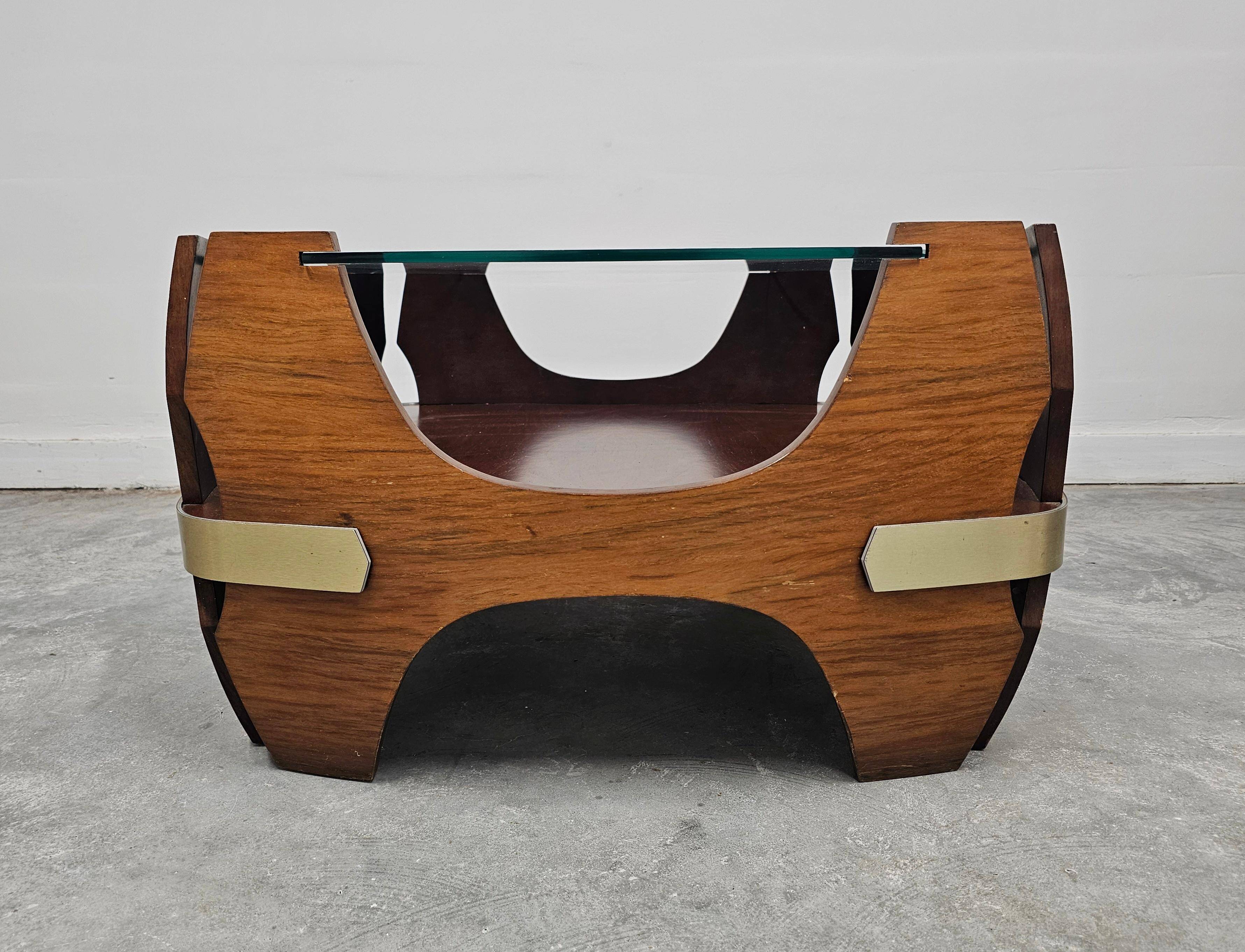 Mid-century coffee table in curved plywood with a glass top, 1940s.
