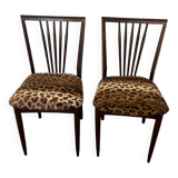 Pair of vintage wood and leopard chairs