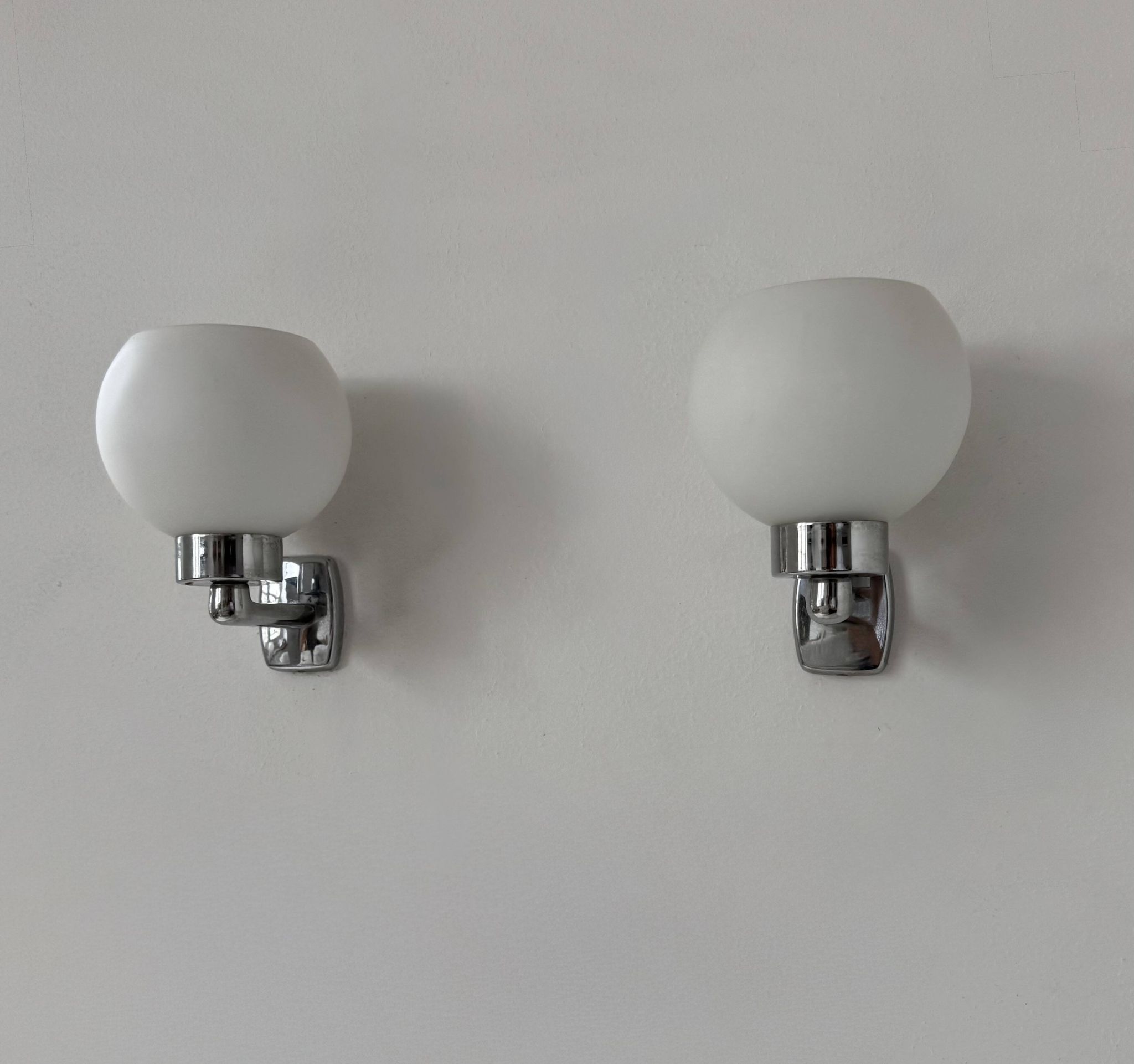 Pair of vintage wall lights, chrome and opaline glass, France, 1970