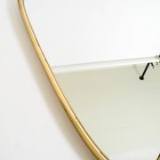 Heavy mid-century brass kidney-shaped wall mirror from Münchner Zierspiegel
