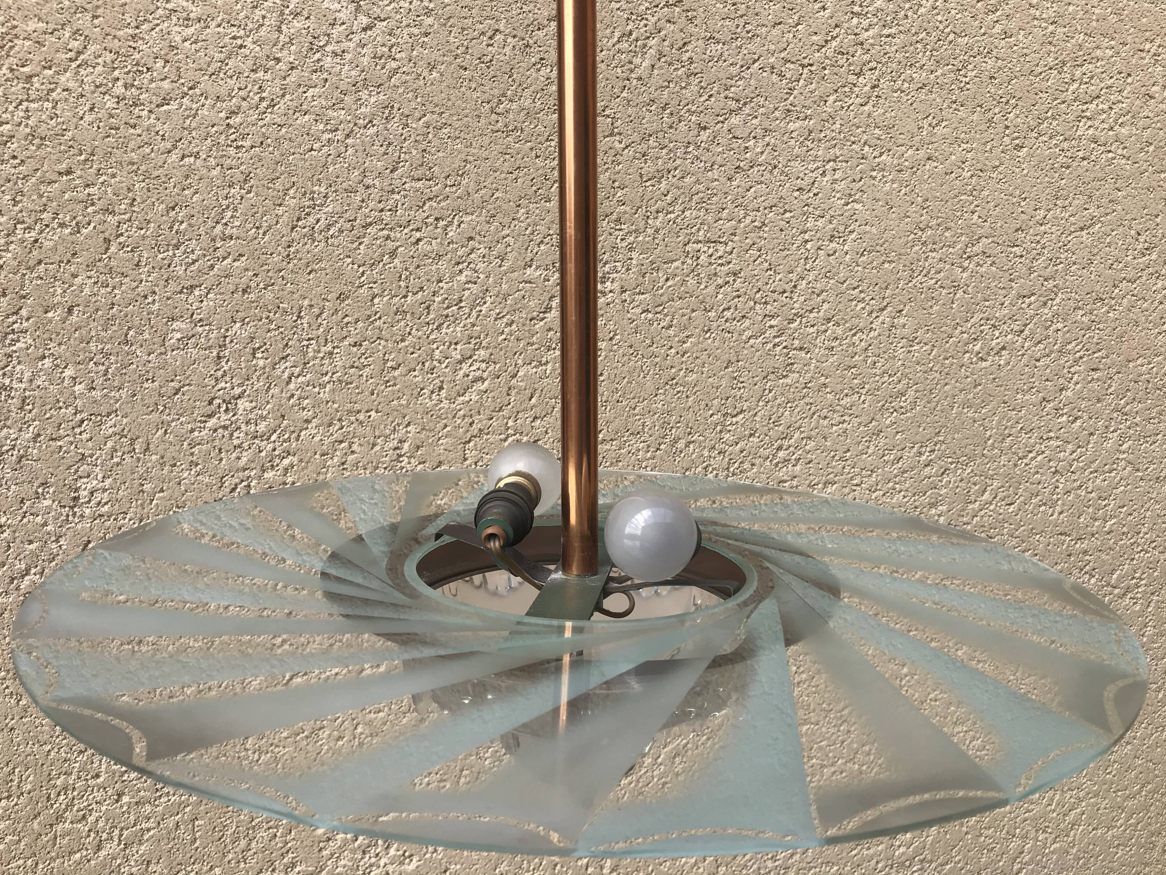 Copper and glass hanging lamp with his Ezan glass disc