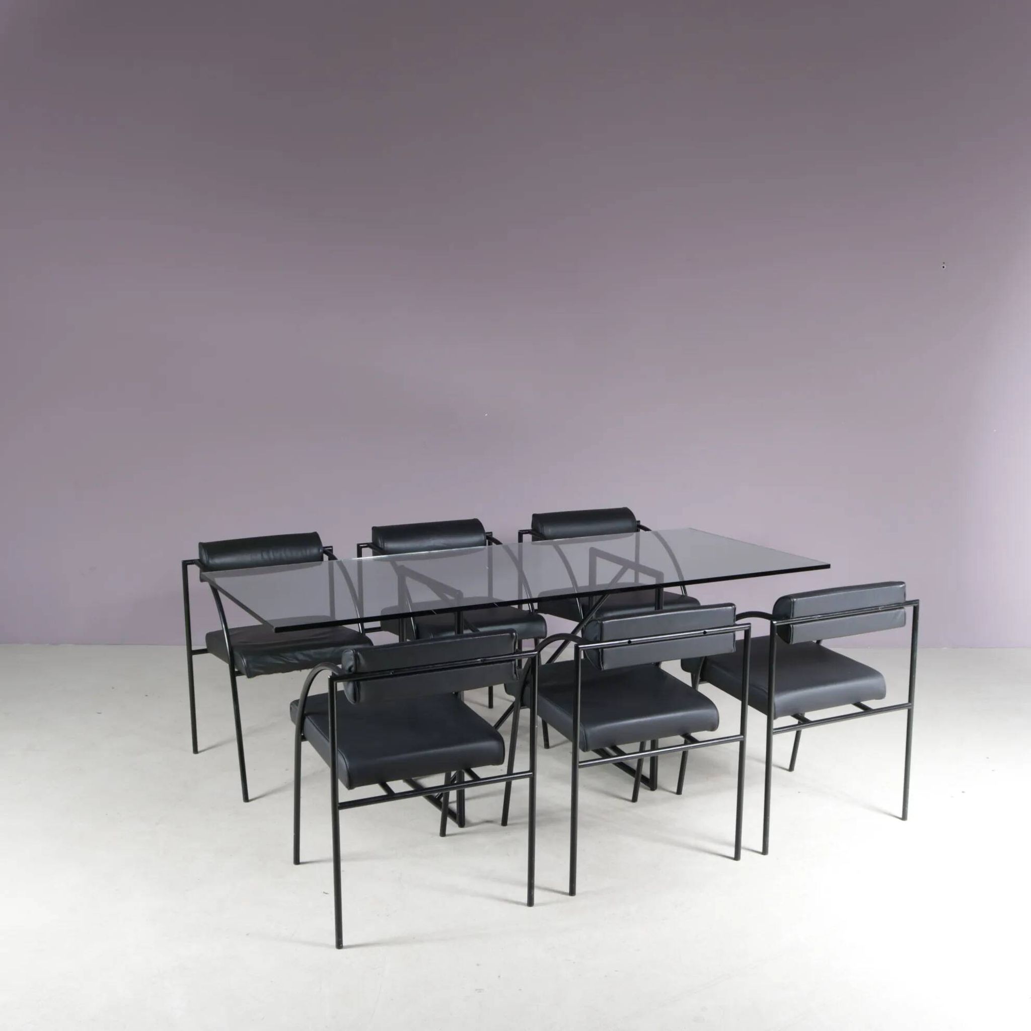 1980s “Tokio” dining table with six “Vienna” chairs by Rodney Kinsman for Bieffeplast, Italy