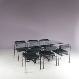 1980s “Tokio” dining table with six “Vienna” chairs by Rodney Kinsman for Bieffeplast, Italy
