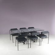 1980s “Tokio” dining table with six “Vienna” chairs by Rodney Kinsman for Bieffeplast, Italy