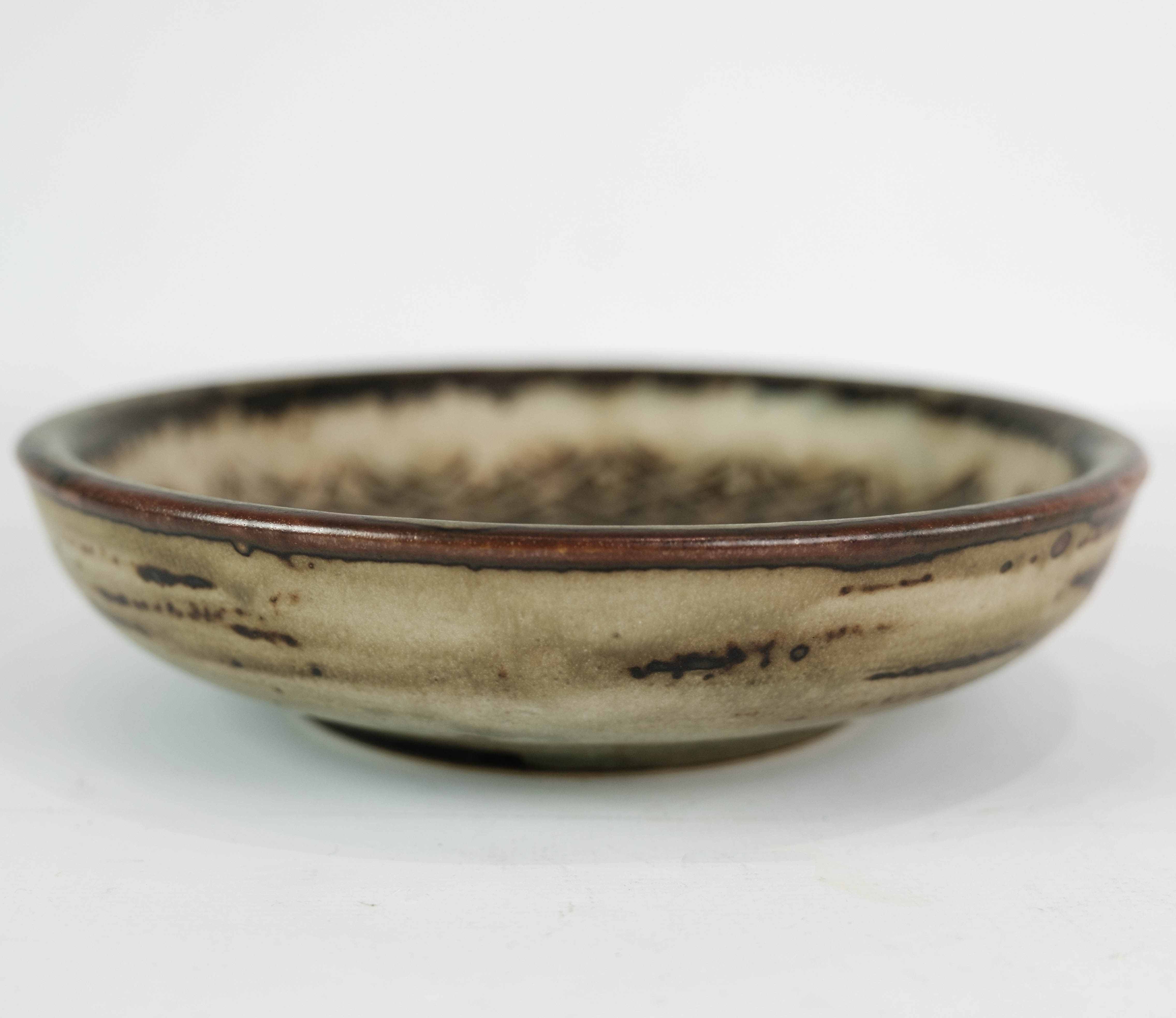 Stoneware bowl in brown colors, no.: 21567 by Gerd Bøgelund for Royal Copenhagen