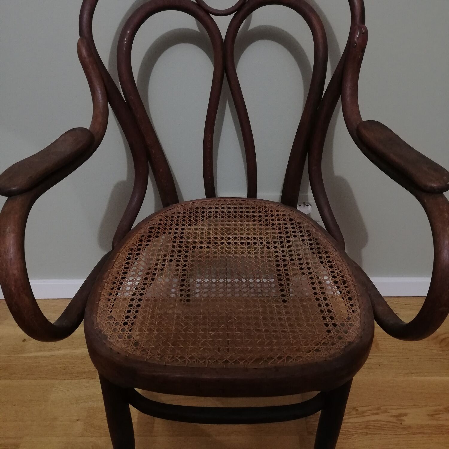 Canned armchair in curved wood signed J.Kohn
