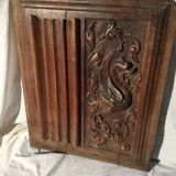 Facade of wooden cabinet door scultpté.