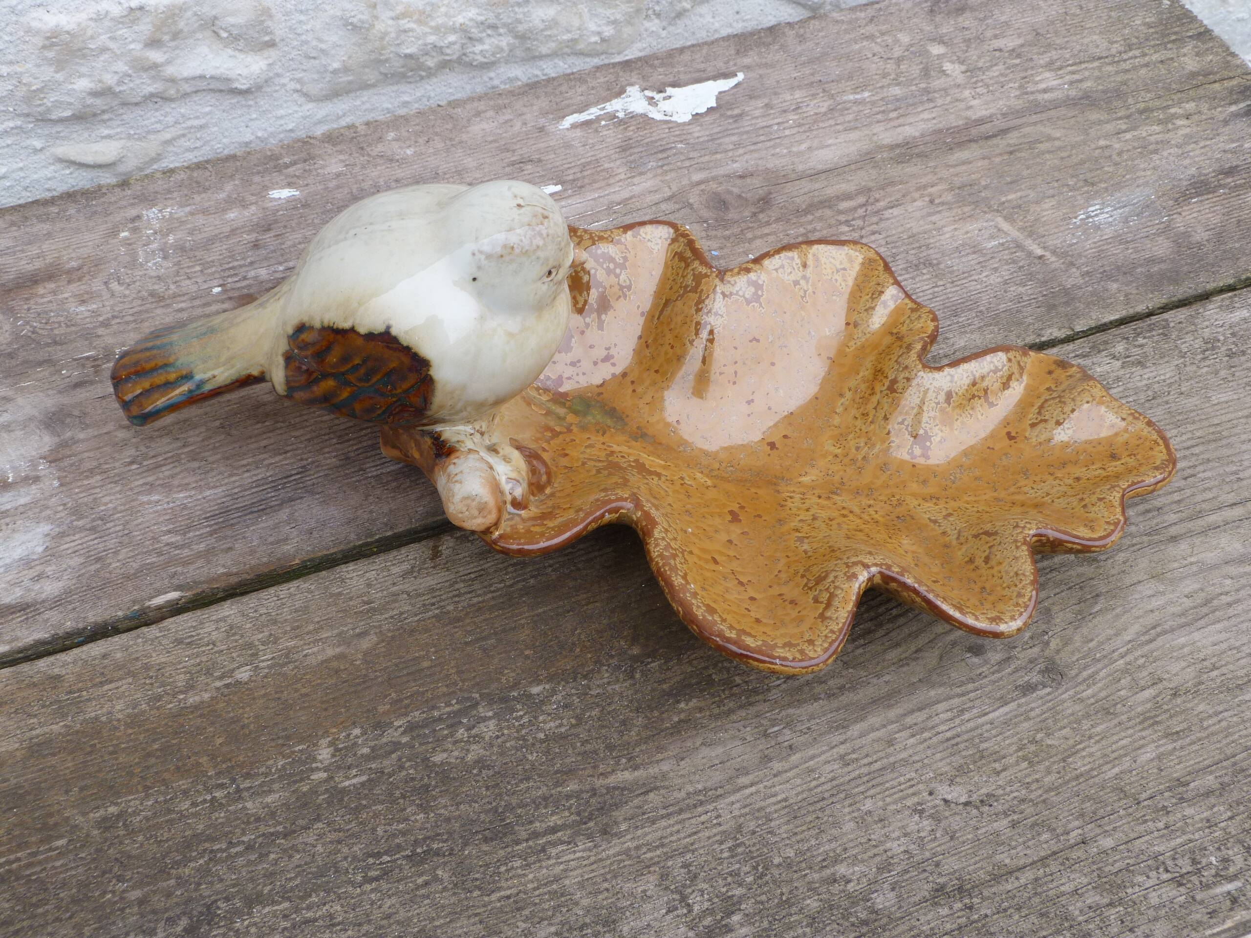 Dish or large empty pocket in flamed ceramic with bird motif