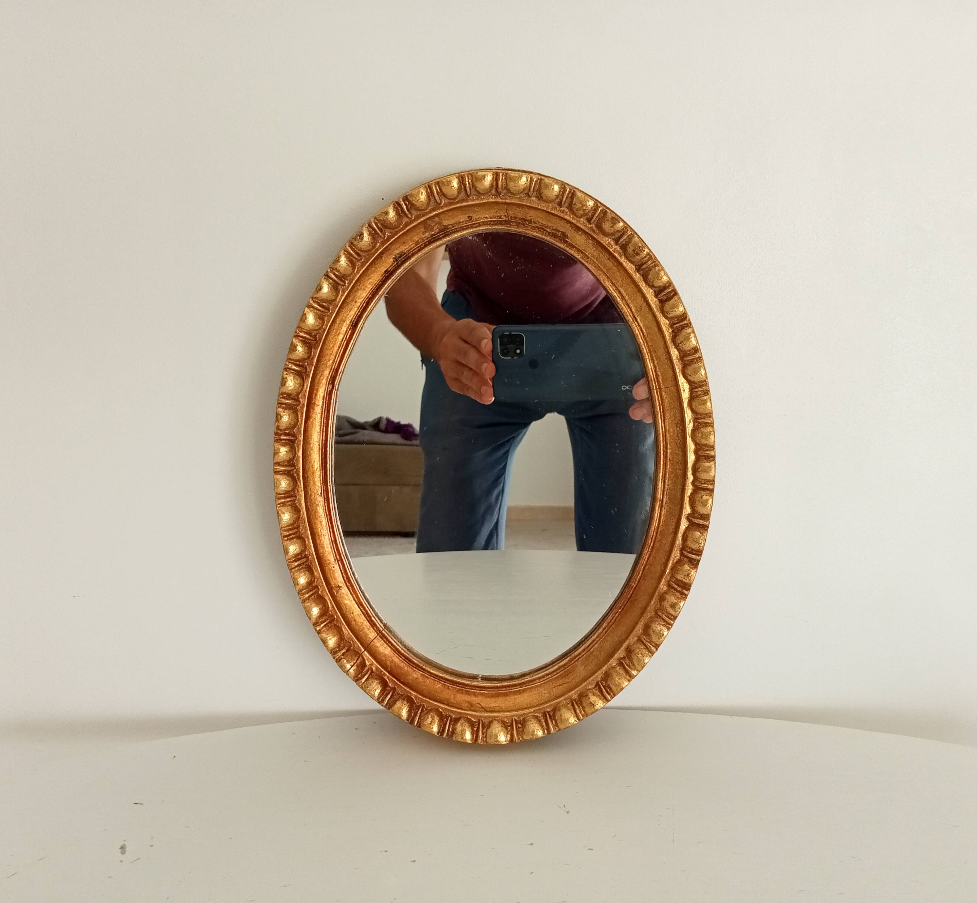 Miroir ovale italien vintage en bois doré