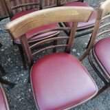 Set of 4 bistro chairs in curved wood and vintage red skai seats.