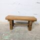 Small rustic footrest bench