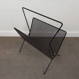 1950s magazine rack in perforated sheet metal