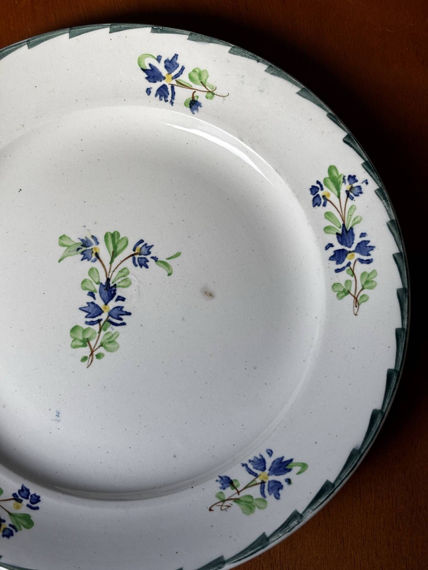 Set of 4 antique dessert plates, Terre de Fer floral pattern.