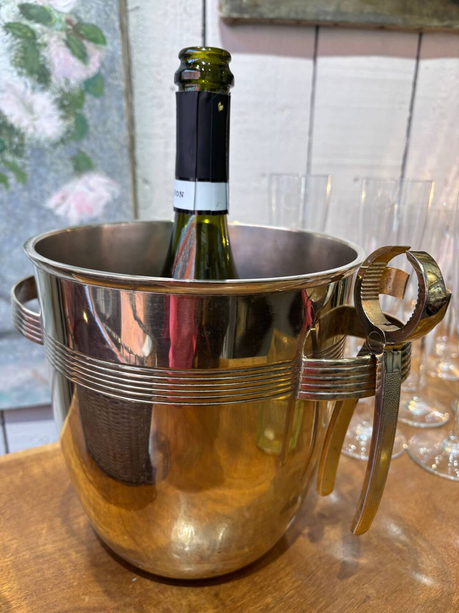 Alpaca champagne bucket from the 1920s with its monopole tongs.