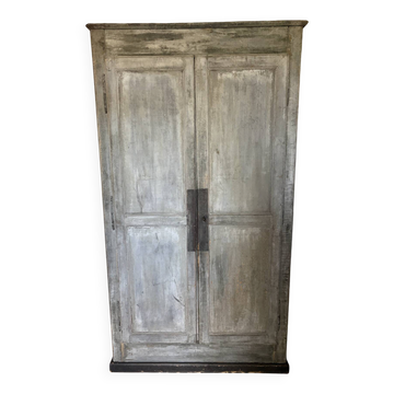 Antique Provençal wardrobe with a patina