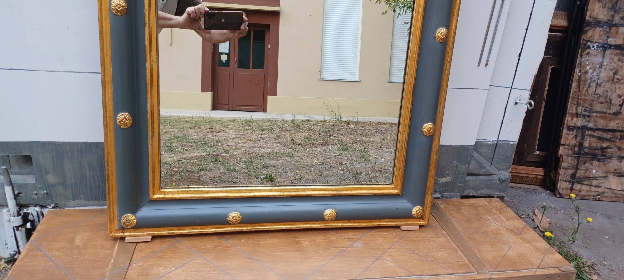 Louis-philippe grey and gilt mirror decorated in the antique style