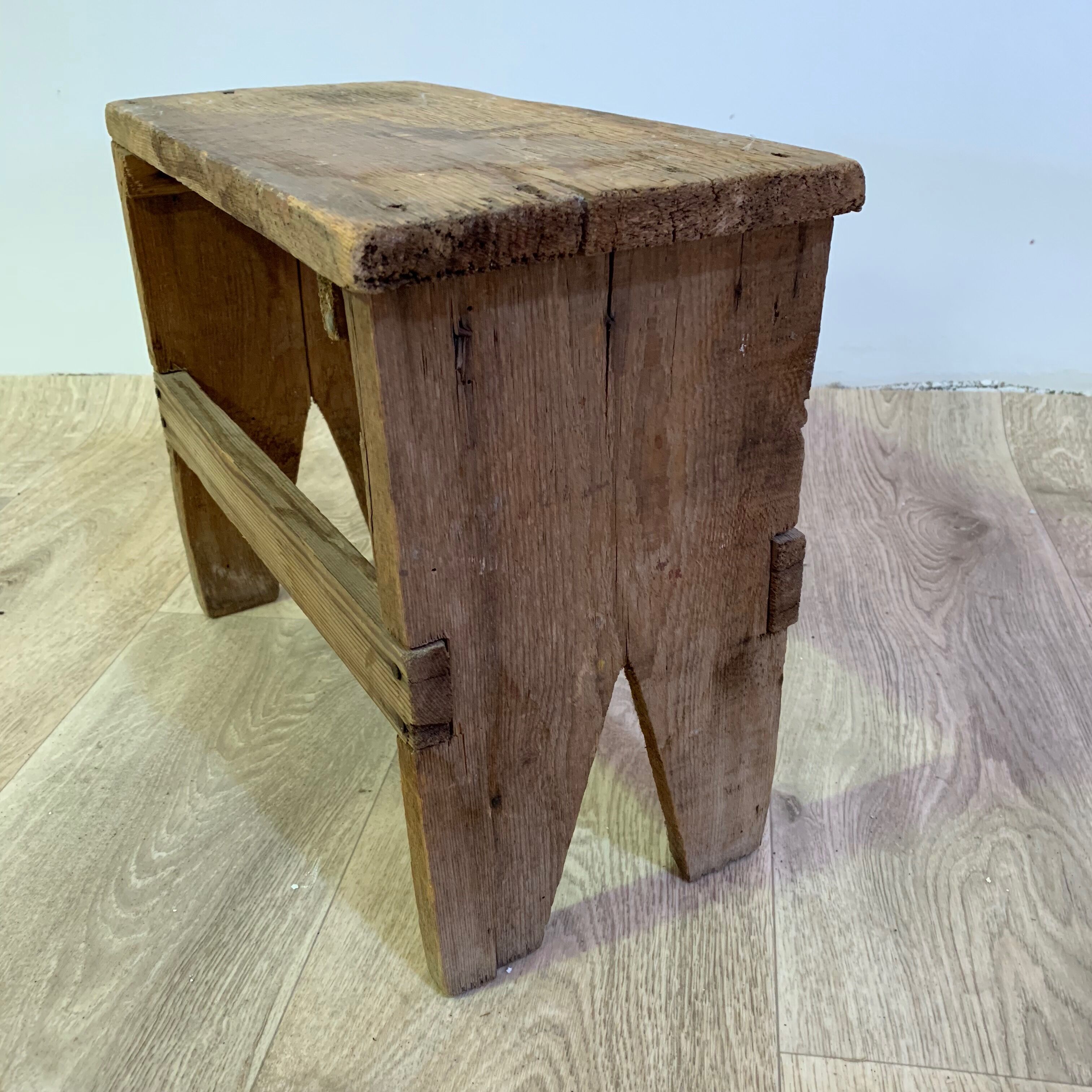 Old wooden foot foot stool
