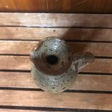 Old vintage brown stoneware pitcher