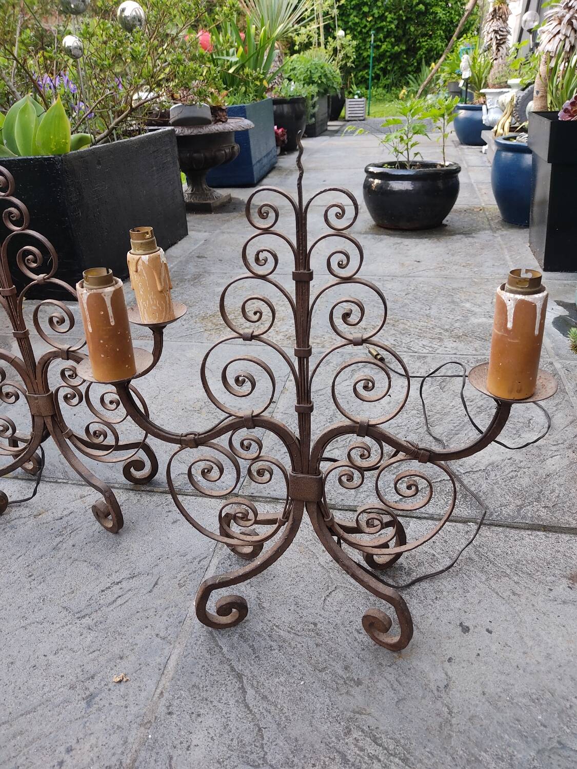 Pair of antique wrought iron lamps