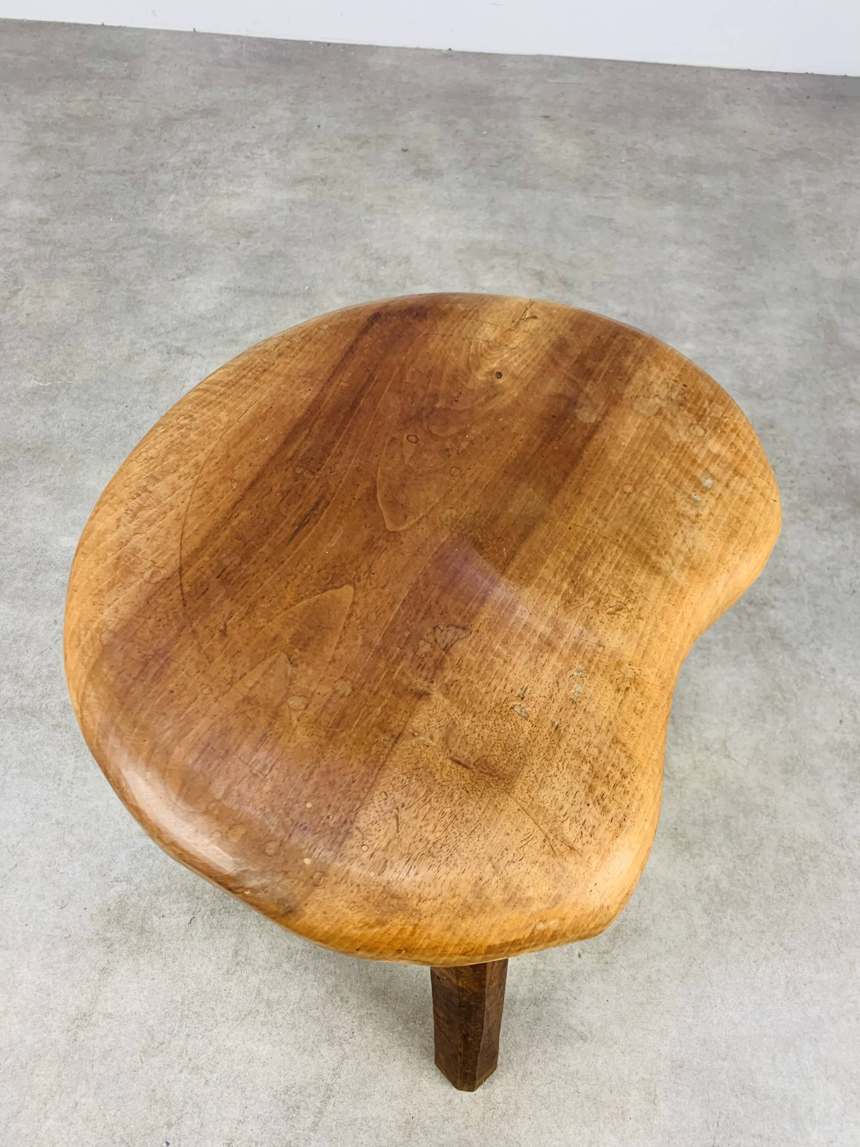 Brutalist tripod stool in solid wood