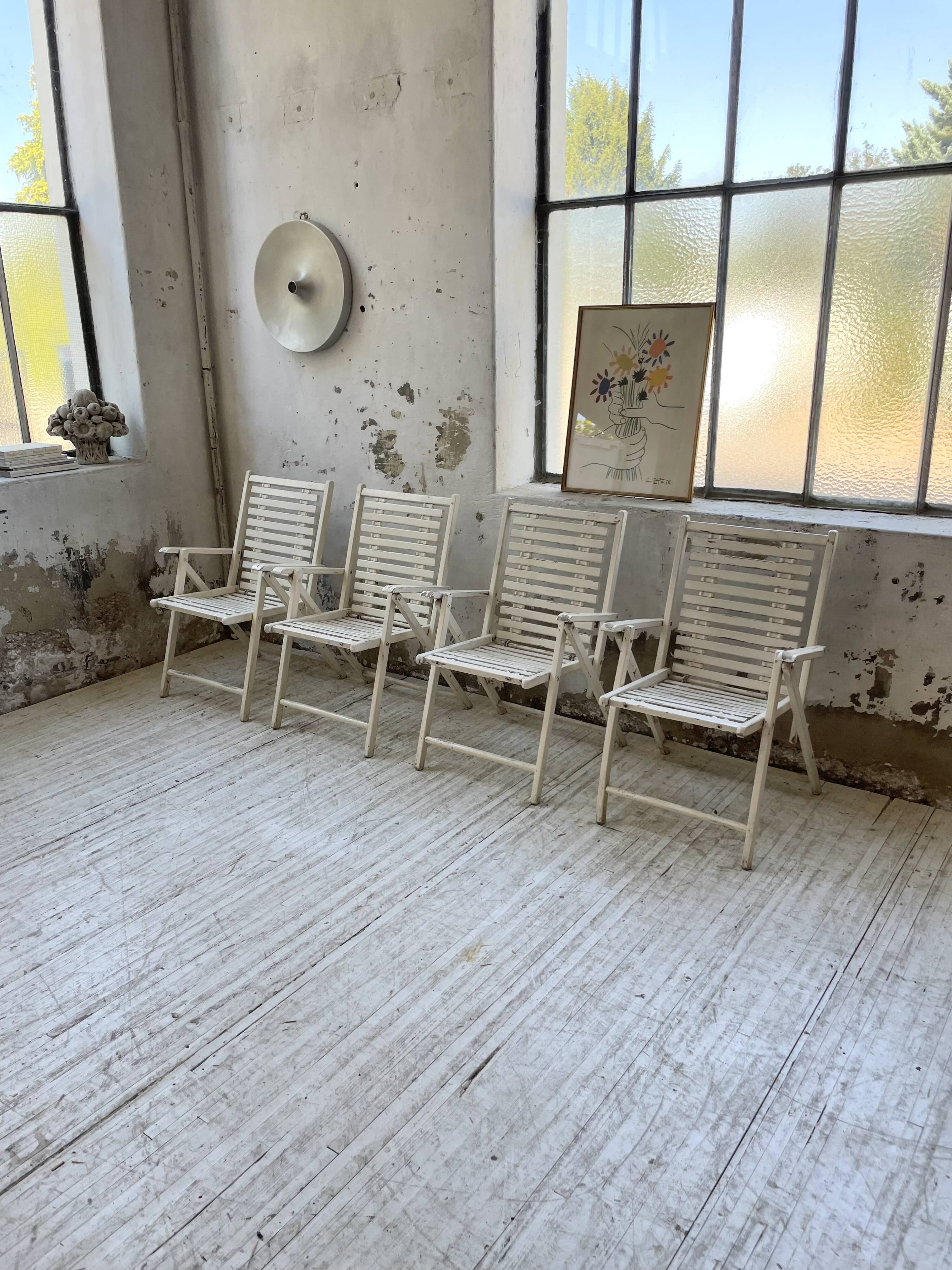 4 white wooden garden chairs