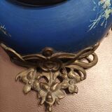 Wall clock in glazed earthenware decoration and brass chain empire style