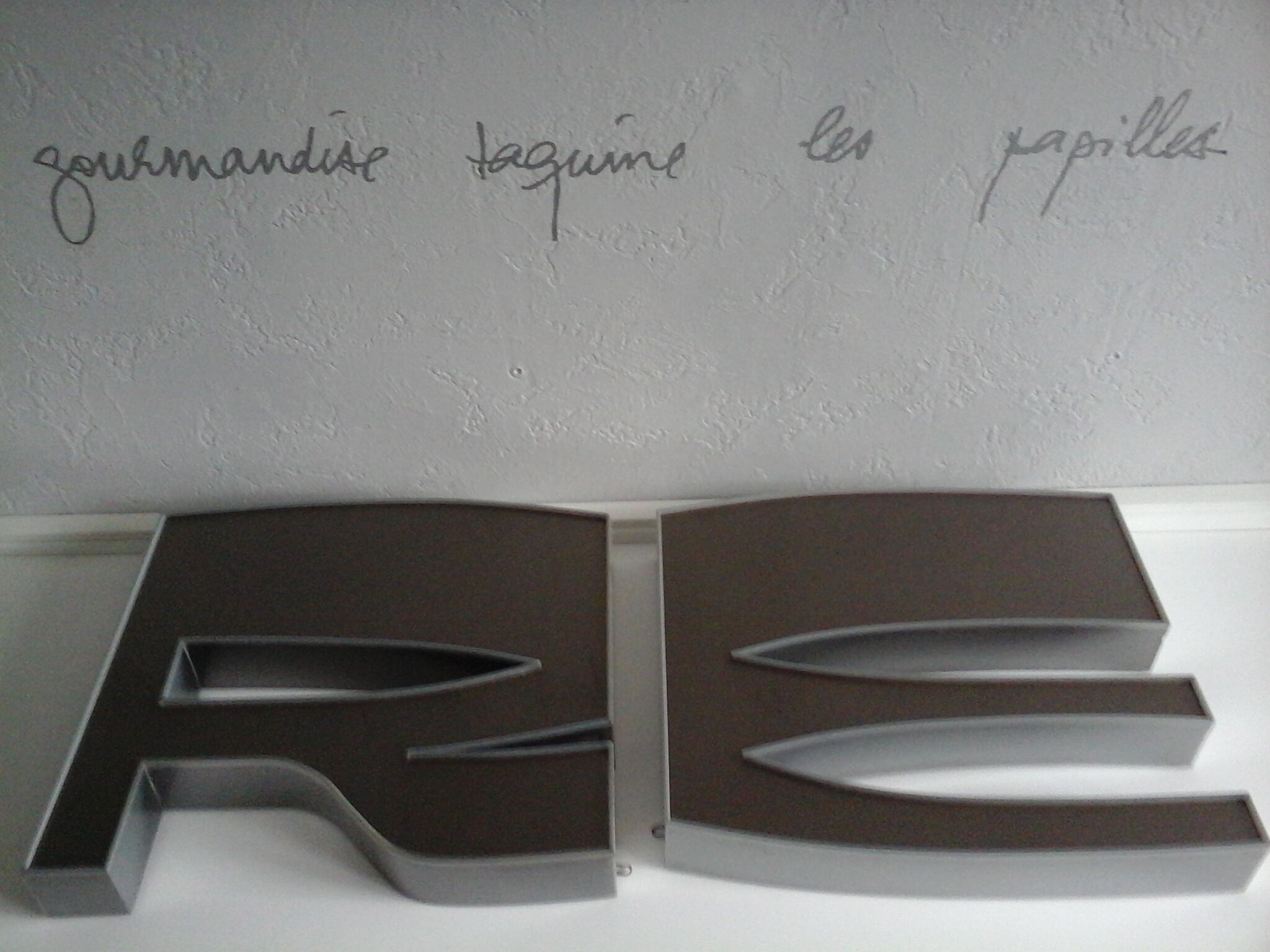 Vintage "E" sign letter