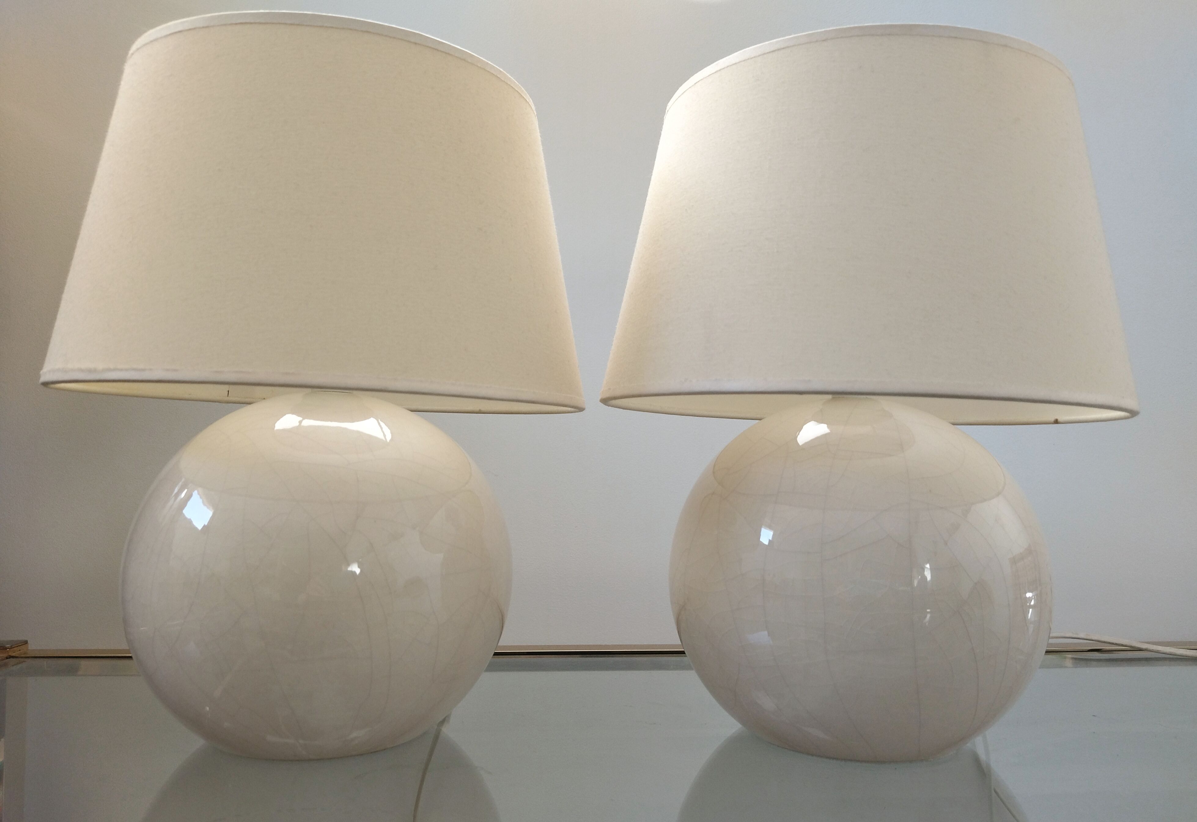 Pair of cracked white Kostka lamps