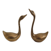 Two brass swans