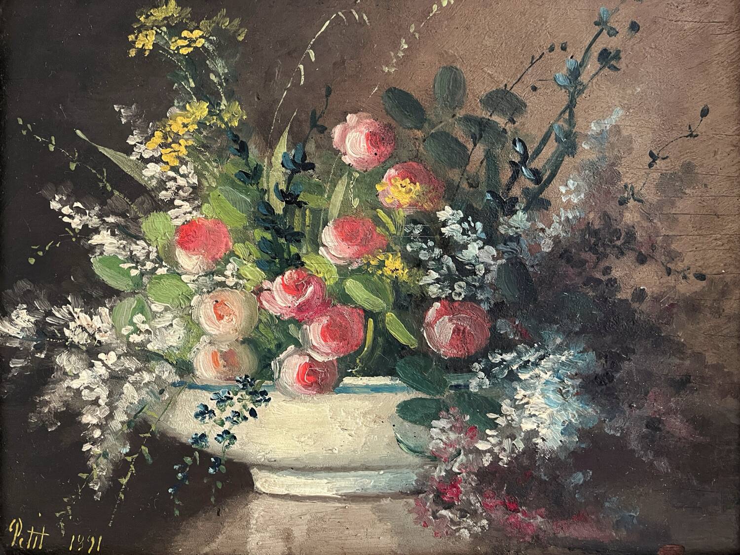 Old oil painting on wood of a bouquet of flowers signed Petit.