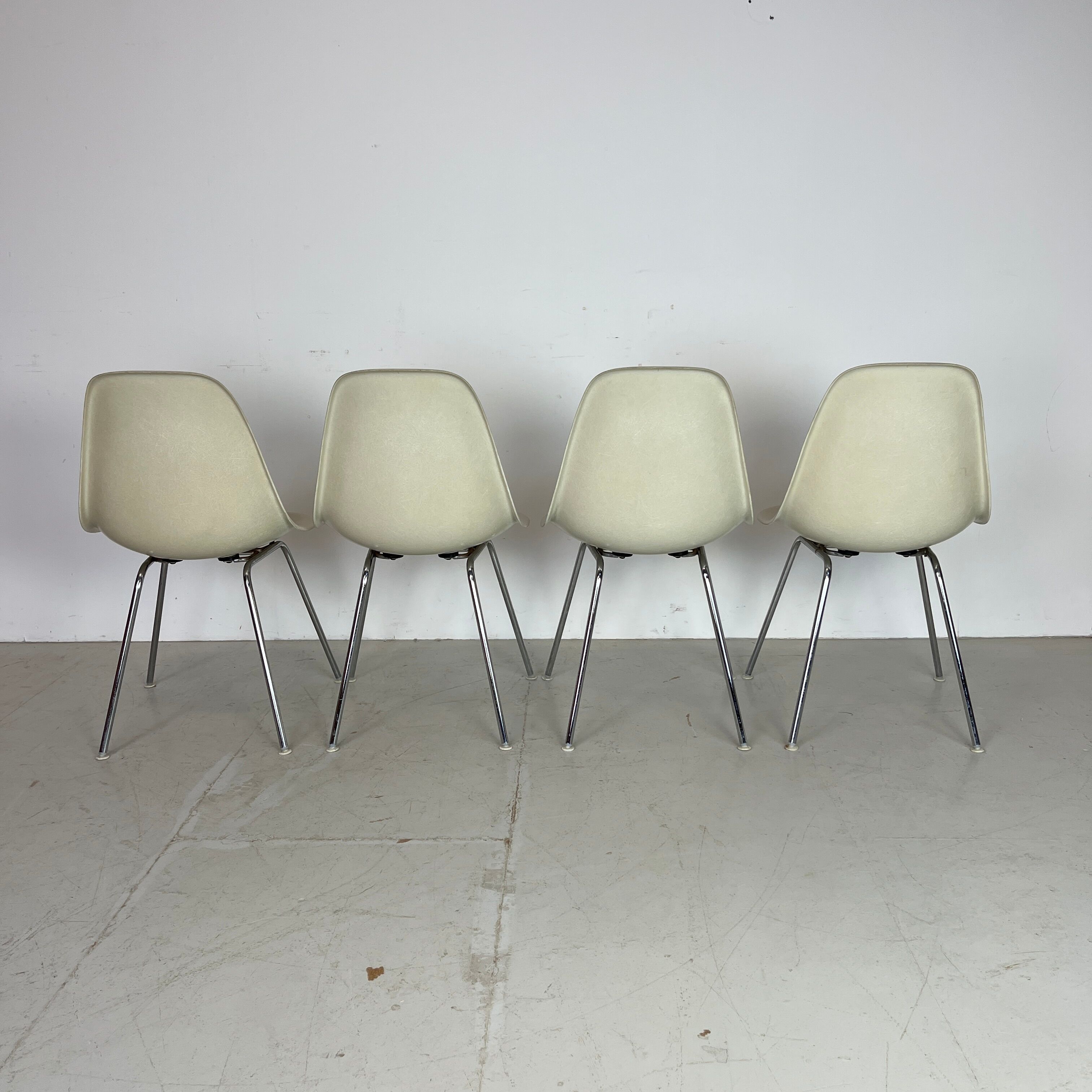 Vintage Eames Herman Miller DSS side chairs in parchment