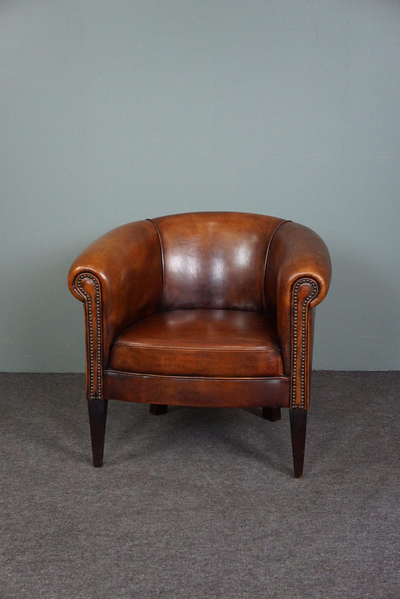 Beautiful sheep leather set of two club chairs and a 2 seater sofa