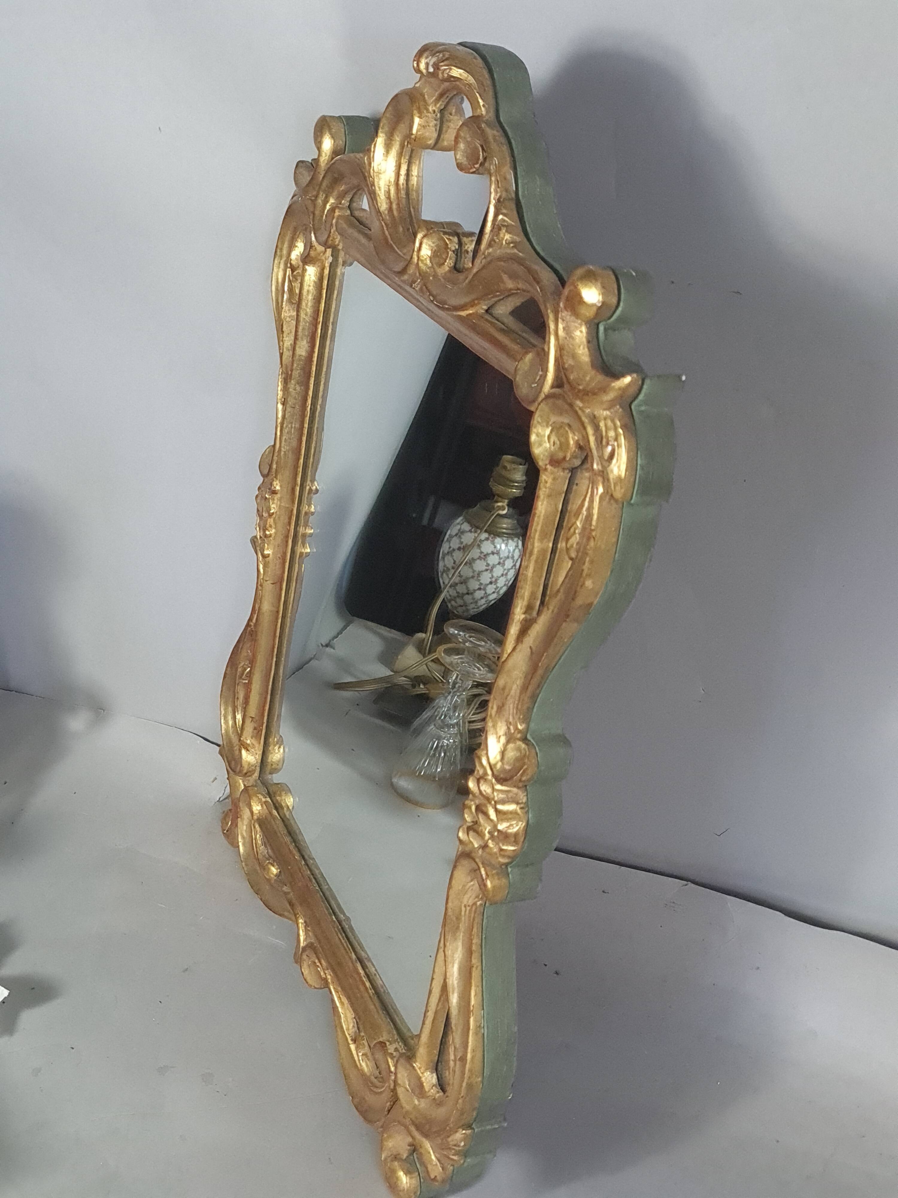Antique mirror with carved wooden frame and original gilding, 53x37 cm, SD207.