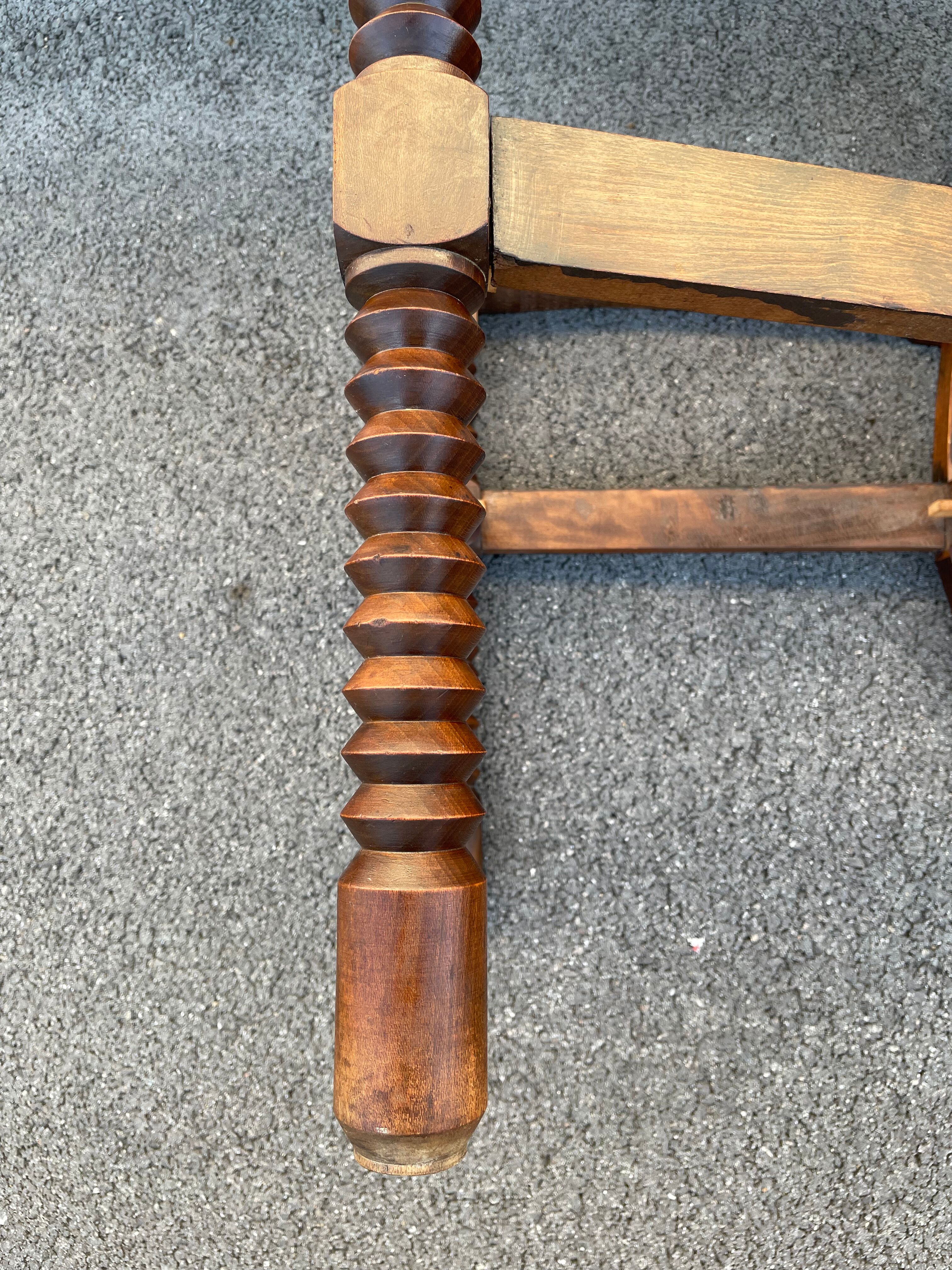 Vintage armchair in straw and brutalist wood