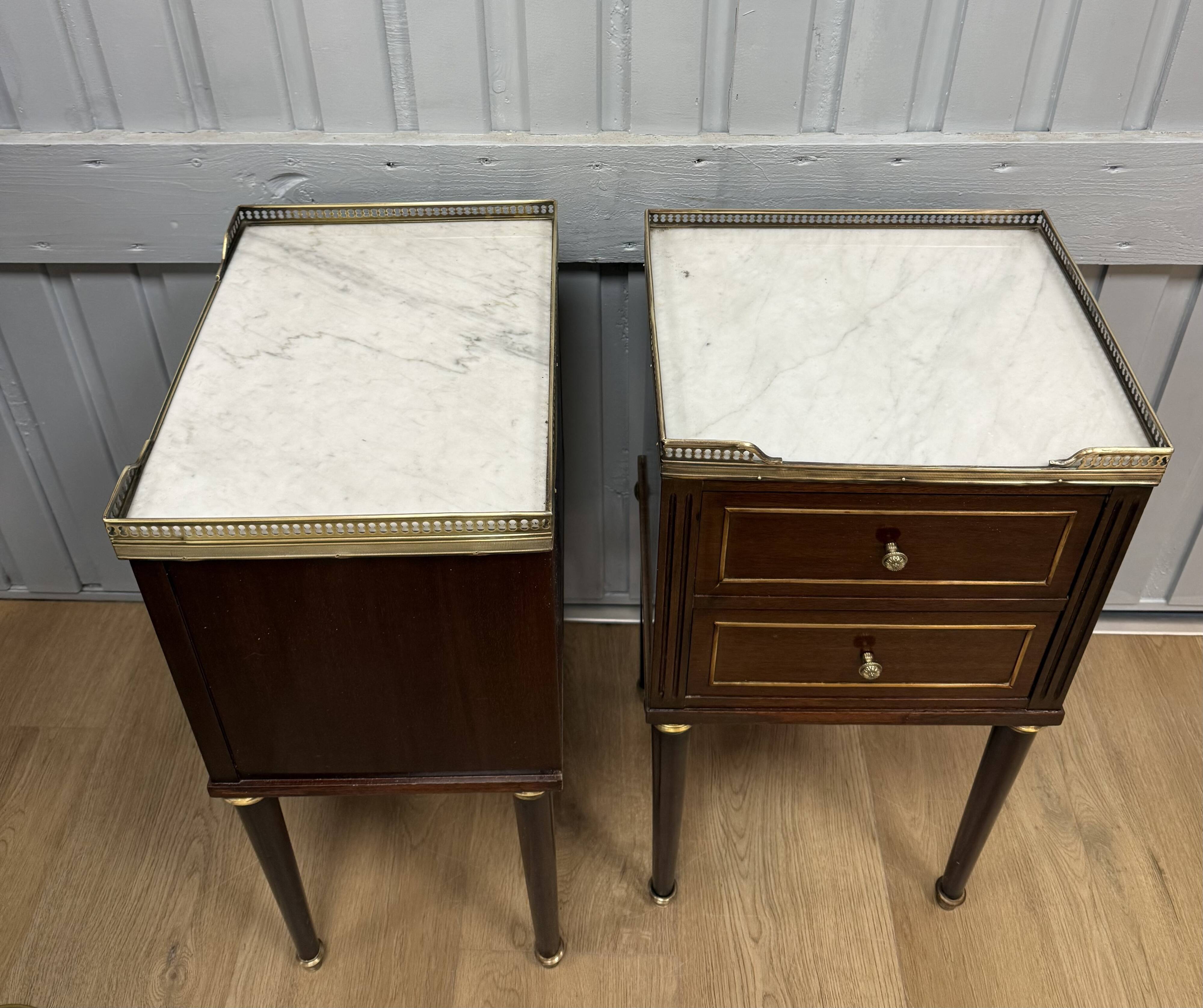 Pair of Louis XVI style bedside tables in mahogany