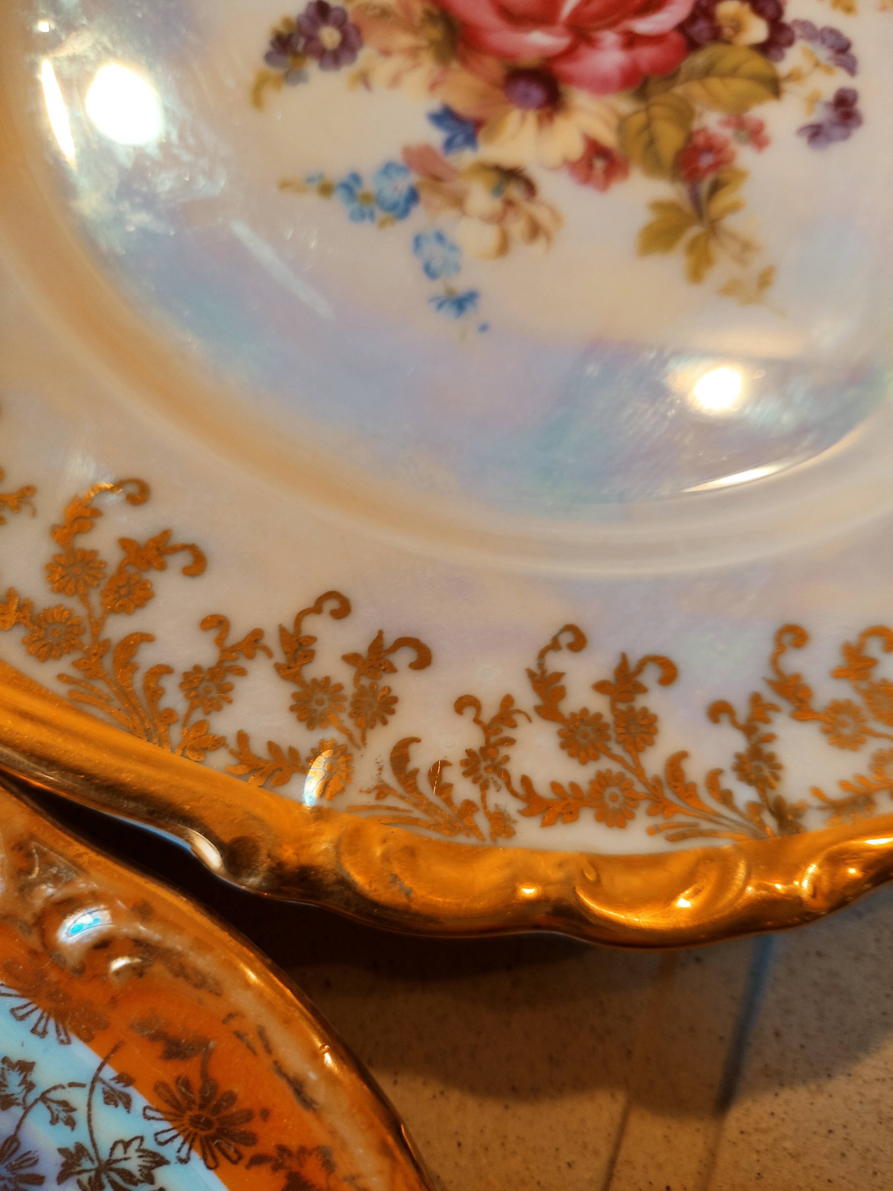 6 mismatched dessert plates decorated with roses